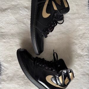 Jordan Black and Gold High-Top Sneakers
